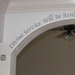A wall decal on an archway - Divine Service will be rendered