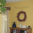 Wall words above the bookshelves and a window with drapery window box on the left side