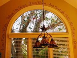 Wall decal on the colonial design window with blinds and a hanging chandelier